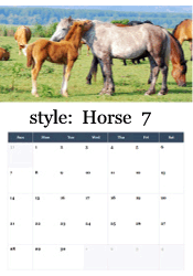 Affectionate mare nuzzling her young foal in green pasture