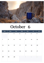 Coffee mug on mountain rocks October calendar